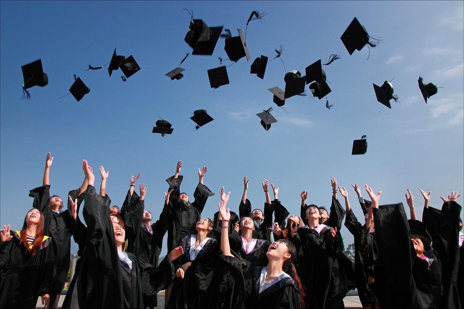 Graduates celebrating university achievement